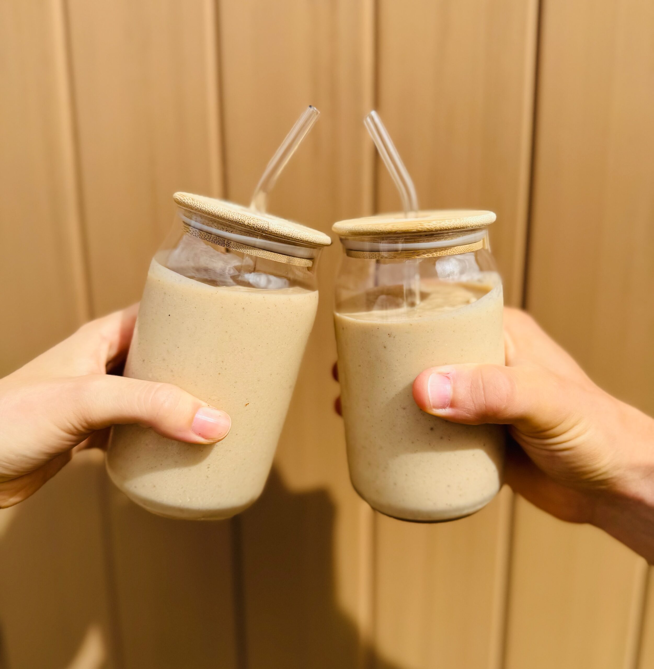 A banana bread date smoothie in a glass